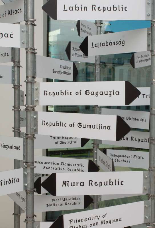 Société Réaliste, “Windroad”, orientation structure with the direction signs of 50 states that have emerged and disappeared during the 20th century in Europe, 2011